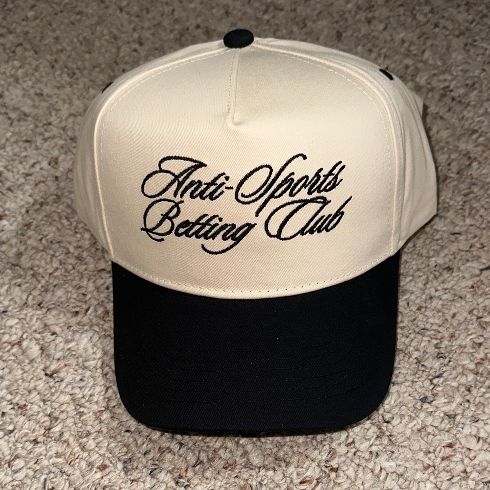 “Anti sports betting club” Black and Cream Cap with Script Embroidery